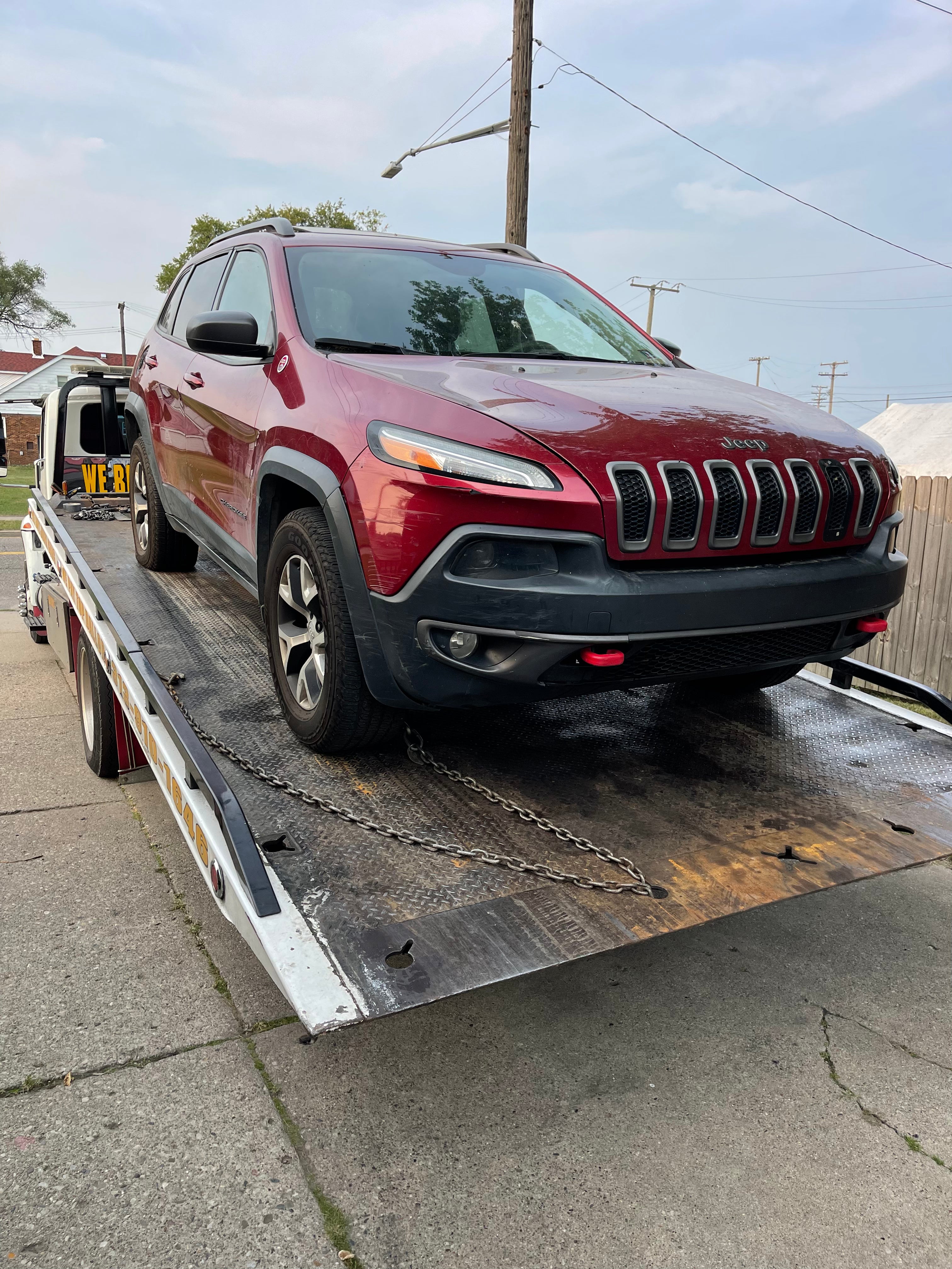 Jeep car on towing truck